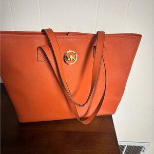 Michael Kors Orange Leather Tote with Gold MK Medallion
